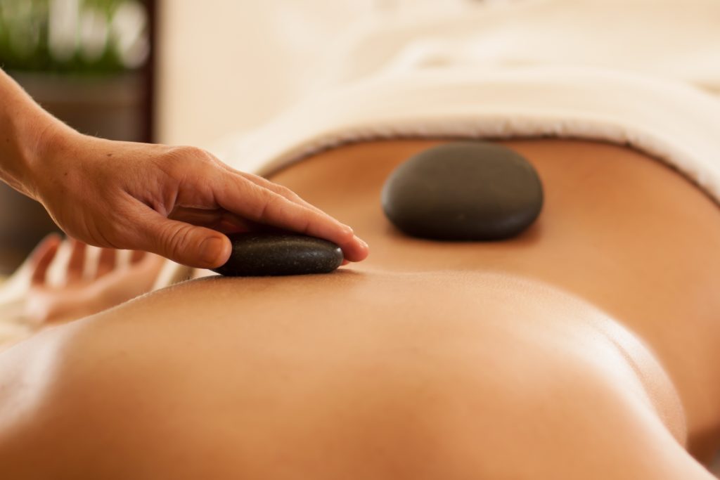 Hot stone massage by Dreamclinic Massage Seattle and Redmond